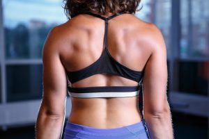 strong woman's back muscles